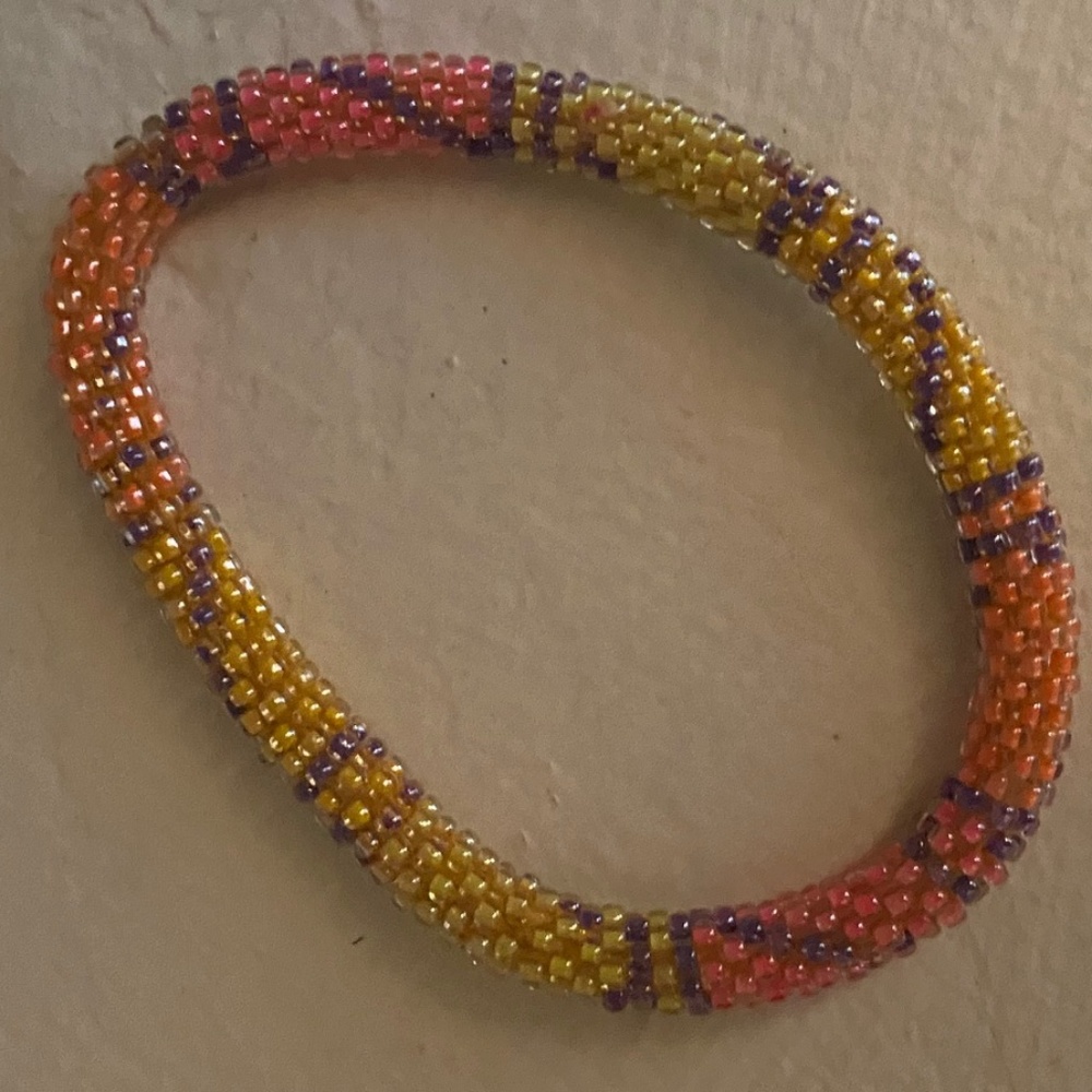 Bright pink & yellow & orange woven bracelet